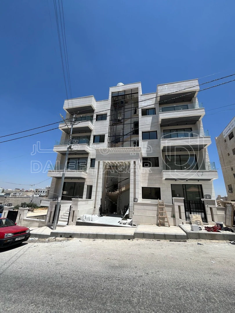 شقة في شقة للبيع في مرج الحمام بالقرب من دوار البرديني - 59,000 دأ - صورة 1